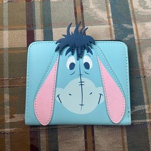 Eeyore face wallet from loungefly.